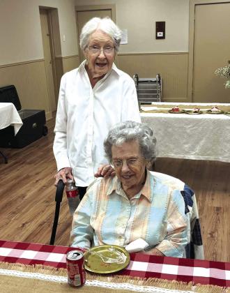 Panzee Fikes (sitting) visited with close friend Vera Ralston before family and friends arrived to celebrate her 95th birthday. Photo courtesy of Barry Fikes