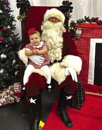 Whitley Jacobs, our littlest Dillo, with Santa! She will get all of her Christmas wishes!