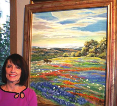 Jane Felts Mauldin is shown with her oil painting, "Spring Countryside in Texas." Jane will speak at the San Saba Museum meeting on Sunday, May 1st.