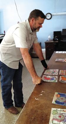 County Judge Jody Fauley making the touch decisions!