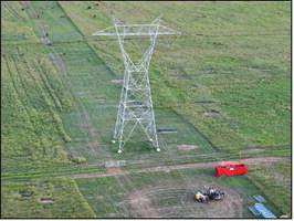 The new overhead transmission line is in place, and now easement gates are being installed along the boundary fences to provide access to the entire easement line for service and repair crews. Courtesy of Macy Ledbetter / www.SpringCreekOutdoors.com