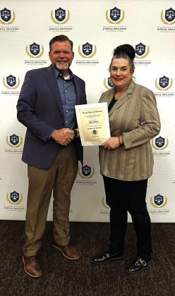 Judge Jody Fauley receiving his award.