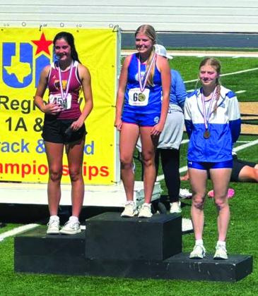 Taylor Randolph on the 1st place podium in the pole vault at the regional meet Courtesy Regina Randolph