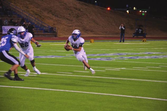 Richland Springs High School varsity football junior wide receiver Jadeyn Bryant (12) makes some nifty moves in the open field.