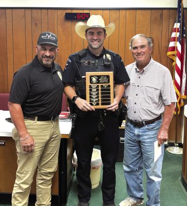 Employee of the Month - Police Officer Jason Gann is pictured here with Chief Stephen Lozano and Alderman Robert Whitten. Courtesy of Scott Glaze