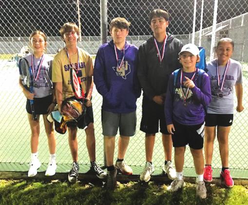 Some of the San Saba Middle School Tennis Team show off their medals they won at the Brownwood tournament last week.