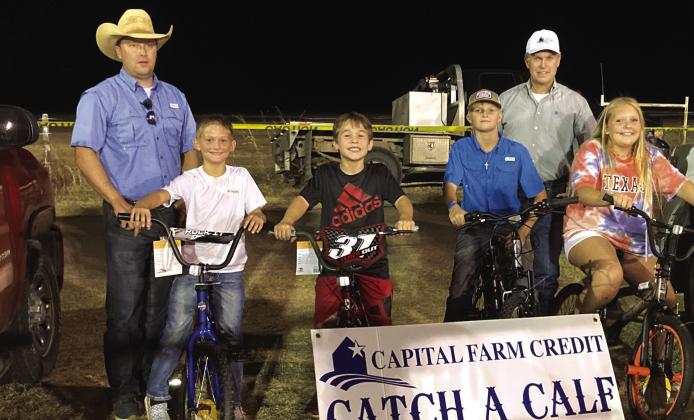 Friday night winners—Bowen Teel, Rexton Hunt, Aden Fry, and Henli Herbert Representing Capital Farm Credit – Vance Bauer and Marcus Amthor Courtesy of Cindy Stewardson