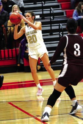 #20 Ema Argote with a 3 pointer in the lady Dillo 65-46 regional win against Flatonia