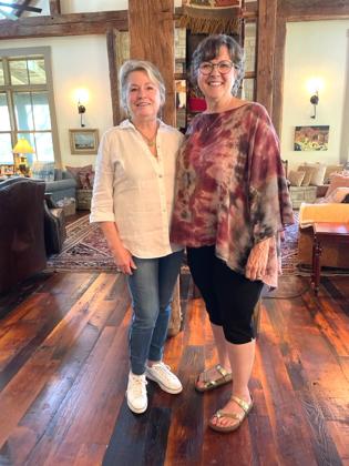 Marsha Smart (right) is pictured with her friend, Betsy Scheffe, who hosted the Pierian Club in the reimagined 1850’s Pennsylvania barn she and her husband Steve bought in 2015.