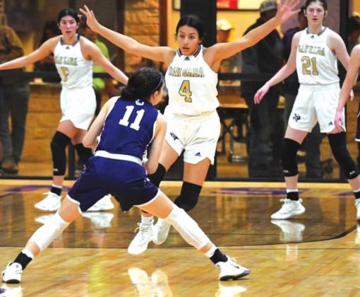 San Saba High School girls varsity basketball senior guard Maritza Aguirre (4) plays tight defense on Tuesday, February 8th, during the Lady Dillos’ 37-35 loss at home to district rival Mason High School. (Photo by Rita Boultinghouse)