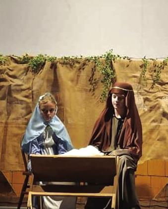 Cherokee Baptist Church presented the Children’s Christmas program December 10th. Georgia Broyles played Mary and Holdin Boswell played Joseph in the Nativity play. Photo by Katie Boswell
