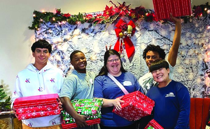 This group of young men from the Cherokee Home for Children, chose to spend time spreading holiday cheer in our community! They wrapped gifts and took them to the memory care residents at a local nursing home. We're so proud of their willingness to help others this Christmas season. Courtesy of Cherokee Home for Children Facebook page