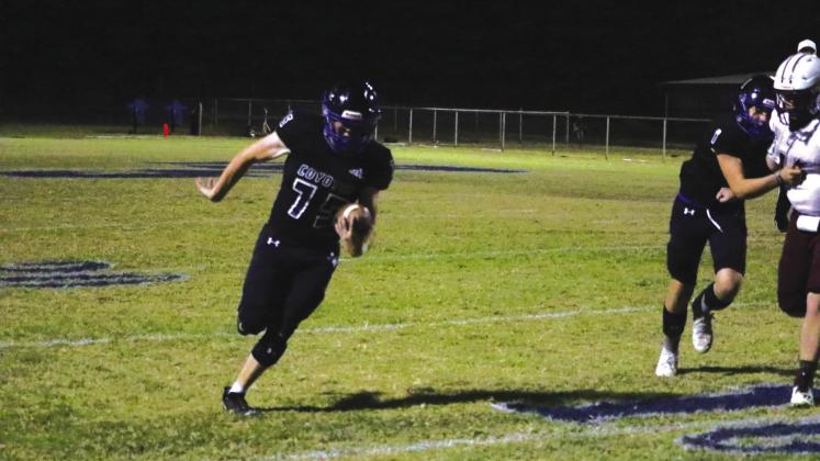 #75 Justin Hutchins making a touchdown in Friday night's game against Lohn. Final score 65-0 Coyotes. Photo by Pam Starr