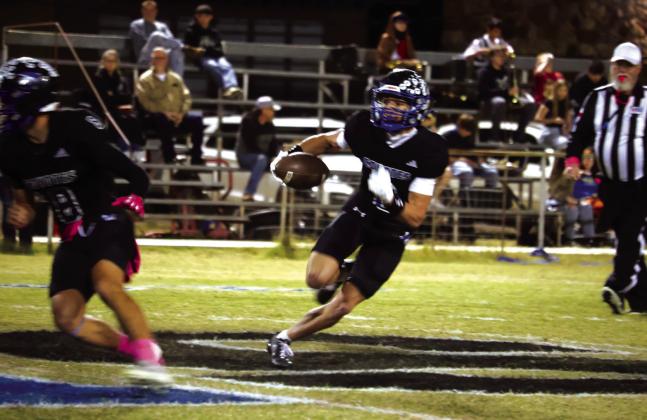 #8 Ethan Deeds Cohen Ethridge carrying the ball Photo by Pam Starr