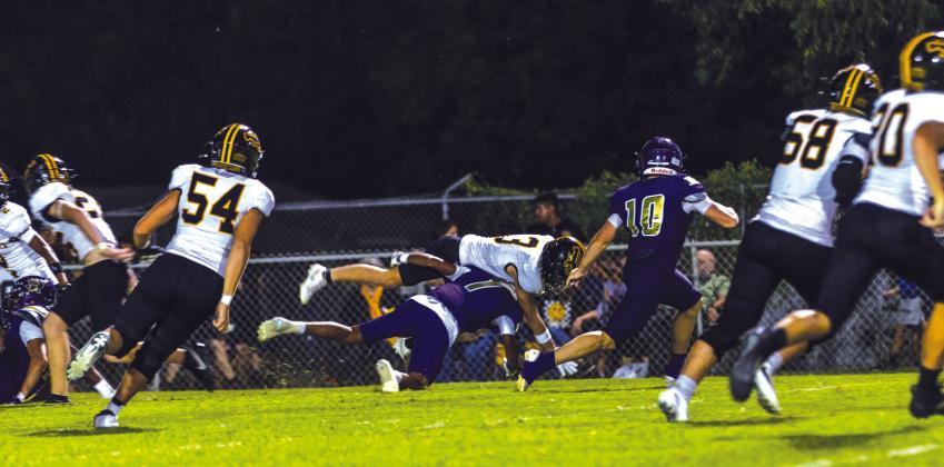 #1 Rome Hatten makes a big tackle for the Dillo defense