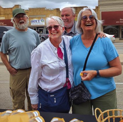 Visitors from Illinois and Colorado came early to enjoy our town before the Total Solar Eclipse. They stayed at the RV Park at the Golf Course. This photo shows them browsing the Pecan Capital Trade Days booths on Saturday.