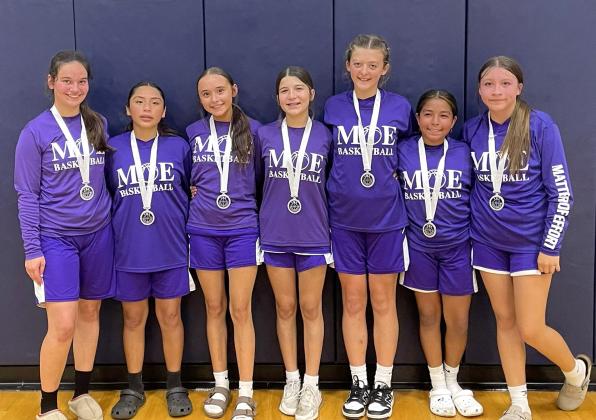 MOE 7/8 traveled to Leander, Texas, on April 26, to take part in the 2026 TWE Spring Splash basketball tournament and battled themselves to a second place finish in the 13 team field. Team members are L-R: Greenly Jo Moore, Carla Jimenez, Cameryn Brockman, Kinlei Vogel, Hadly Reid, Jazmin Reyes, and Khloe Martinez.