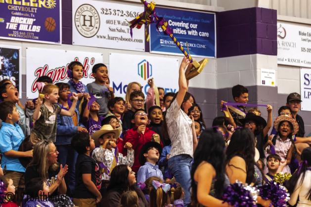 Ms. Pierce - 2nd Grade Teacher is seen holding the Spirit Stick! Courtesy of Kambria King