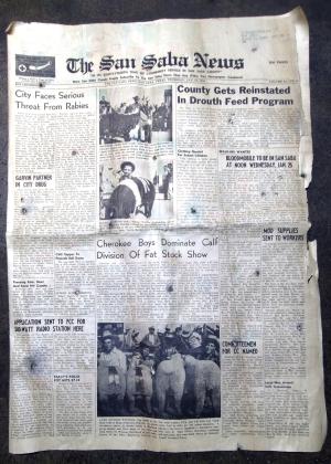The Front Page from the January 19, 1956, edition of The San Saba uncovered in the flood cleanup.