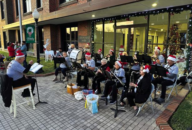 The San Saba River City Band performed before the Lighted Christmas Parade Dec. 13th. The band is directed by Bill Grusendorf. Photo by Buddy Whitley