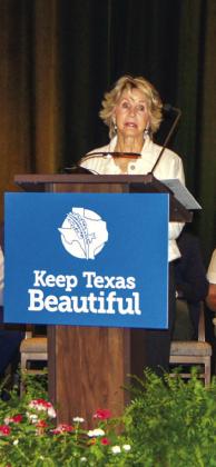 Kathleen Hawkins giving her acceptance speech for the Stan Weik Leadership Award at the Keep Texas Beautiful annual conference