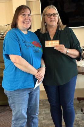 Tess Griffin from the Killeen Garden Club is presenting check to Cindy Sloan