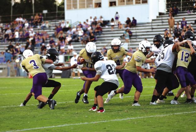 #11 Rome Hatten makes a run for the end zone in the 8th grade's 8-6 win against Hamilton Thursday, September 25.