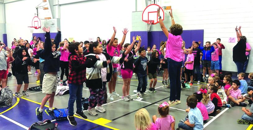 Never Surrender Cancer Foundation representatives, Dora Miller and Donna Shahan, leading students at San Saba Elementary in a “Beat Cancer” cheer! Courtesy of Dani Gilcrease