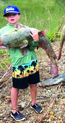 Nine-year-old Caleb Snider caught a 28-pound yellow cat on a fishing trip he just took with his dad (Seth Snider), brother and cousins. They went fishing on a four-day trip on the Colorado River in San Saba County. Caleb caught this yellow cat on his fishing pole! Courtesy of Megan Snider (proud mom)