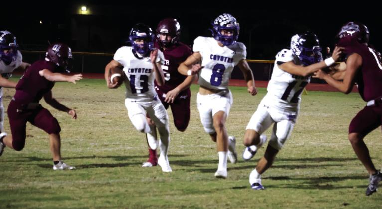 Cohen Ethridge (#13), Ethan Deeds ( #8) , and Hudson Tharp (#12) in the victory of the Bulldogs.