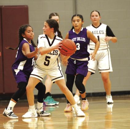 7th - #3 Carla Jimenez and #15 Jazmin Reyes on defense