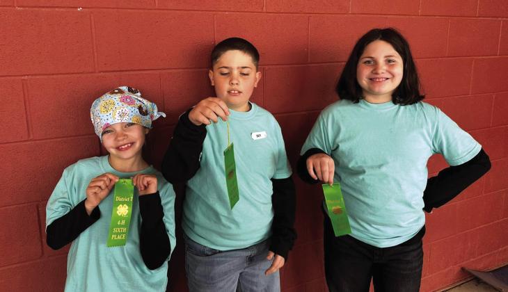 The Glazed Donuts placed 6th- left to right Clara Murray, Thomas Tracy, Ava Spence