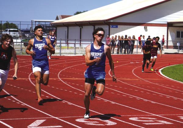 Cherokee HS Seniors Joel Valdez and Jeremiah Wakefield during their relay race at the area meet - photo courtesy of Valerie Valdez