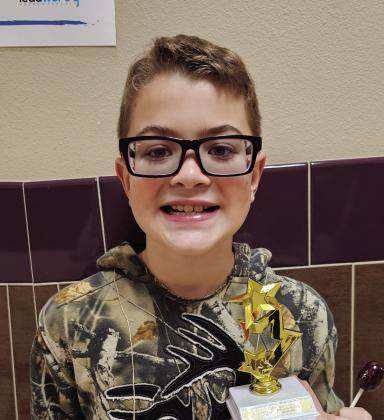 Corbin Ward 2025 Spelling Bee Champion Courtesy of Cecilia Bessent, SSES Pictured right: