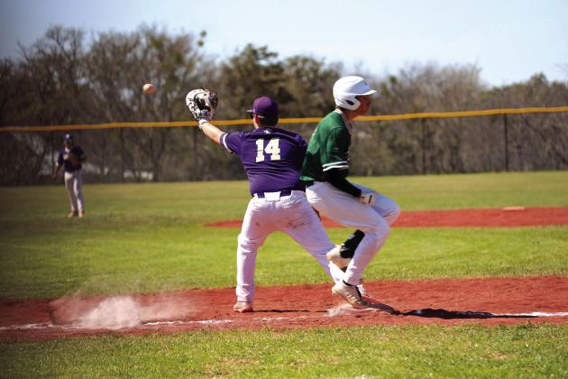 First baseman #14 Layke Haynes ready and alert in last week’s game.