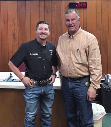 Ty Mann, San Saba Police Department's newest officer (left), is pictured with San Saba Police Chief Steven Newkirk (right). Courtesy of Scott Glaze