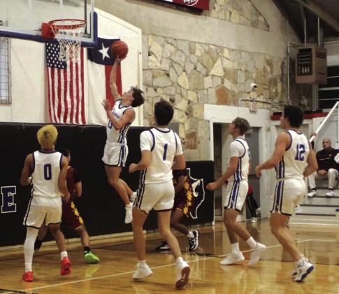 Cohen Ethridge #13 is unopposed going to the basket in last Friday’s victory against Lometa, 73-20.