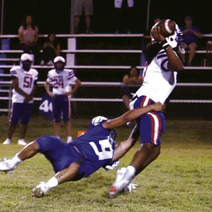 Carlos Preciado making the tackle in the varsity game against SA DaVinci Courtesy Valerie Valdez