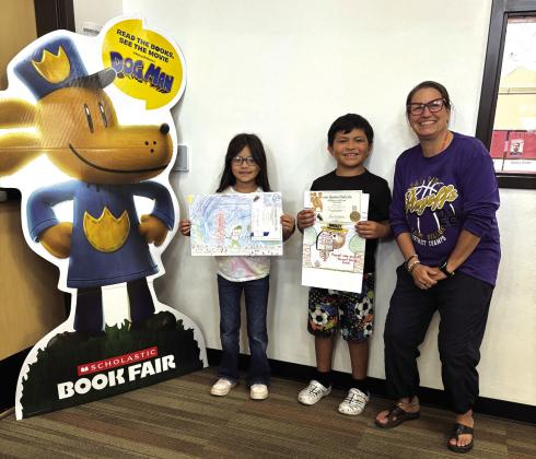 Woodsy Owl and Smokey Bear contest - 3rd Grade: Arisbel Paez, Jurial Sanchez, and teacher Mrs. Jenny Jost
