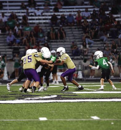 Dillo defense #75 Silver Walts and #11 Rome Hatten stop Burnet runner last Thursday, September 18th.