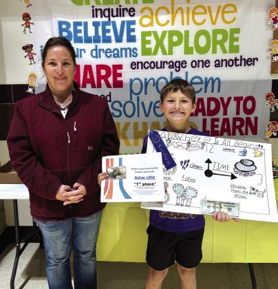 Asher Little, a second grader at San Saba Elementary, earned first place in the San Saba Soil and Water Conservation District’s annual poster contest. This year’s theme was “Soil: Where It All Begins.” Pictured with Asher is Carol Gibson, representing the San Saba Soil and Water Conservation District. Courtesy of Kallie Bush