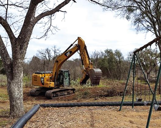 Here is the excavator the crews used to dig out the brush in the creek behind the Museum and playground. Photo by Djuana Payton
