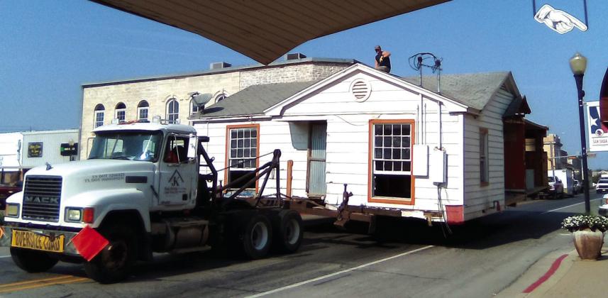 Buildling that formerly housed Taco's Mi Casa makes its way down Wallace Street. Photo by Carolyn Preece