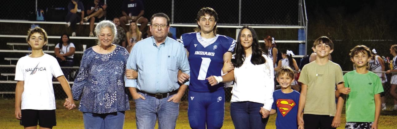 Senior nominee Max Williams escorted by his parents Russ Baker and Shandi Hall, grandmother Donna Baker, and siblings Asher, Knox, Durst, and Ryker