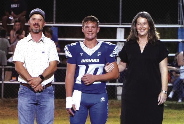 Senior nominee Tatum Shanklin escorted by Brandon Shanklin and Erin White