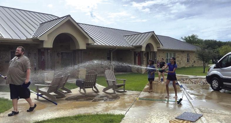 Cottage 6 girls having fun with their house dad Chase, while washing their van