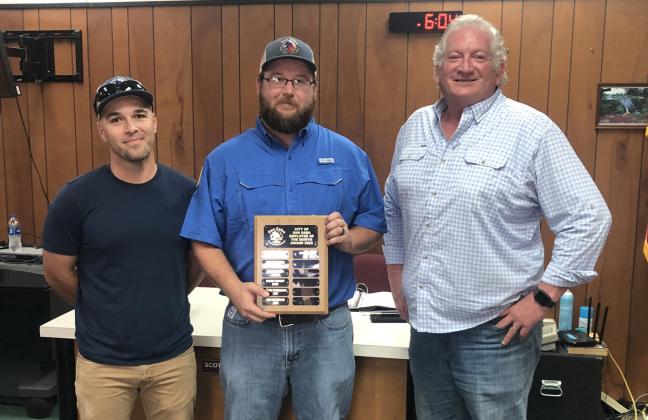 July Employee of the Month Left to right: Jesse Hunt, Water/Wastewater Supervisor; Cody Mann, Water/Wastewater Employee and July Employee of the Month; and Alderman Shawn Oliver