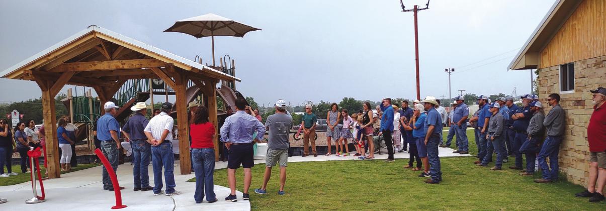 This is part of the over 70 people who attended the Ribbon Cutting Ceremony and official opening of the Stan Weik Memorial Splash Pad at Mill Pond Park on Tuesday, May 28th.
