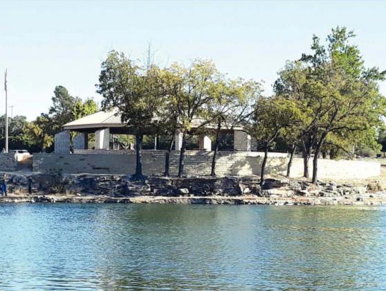 View from across the pond of completed wall.