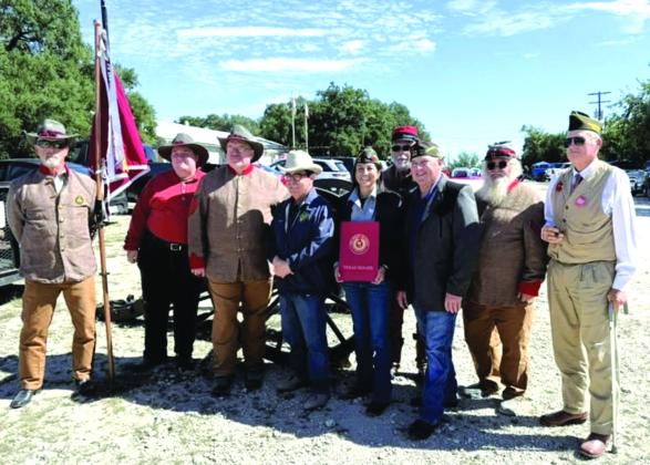 L-R: Stephen Brister; James Oliver, Adjutant; Michael Oliver, Commander; Texas State Senator Pete Flores; Maria Gonzales, VFW Post Commander; Bobby J. Bishoff, VFW District No. 14 Commander; William Dunson, 2nd Lieutenant Commander; and Ross J. Cox, Sr., 1st Lieutenant Commander. Gary Lehmkuhler stands in the back. Photo by Stephanie Oliver